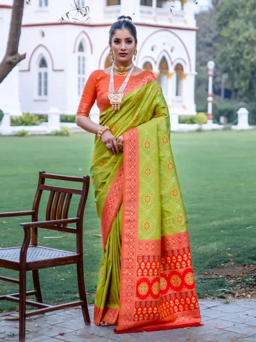 Get Your Glam On with Pista Green Banarasi Patola Silk Saree
