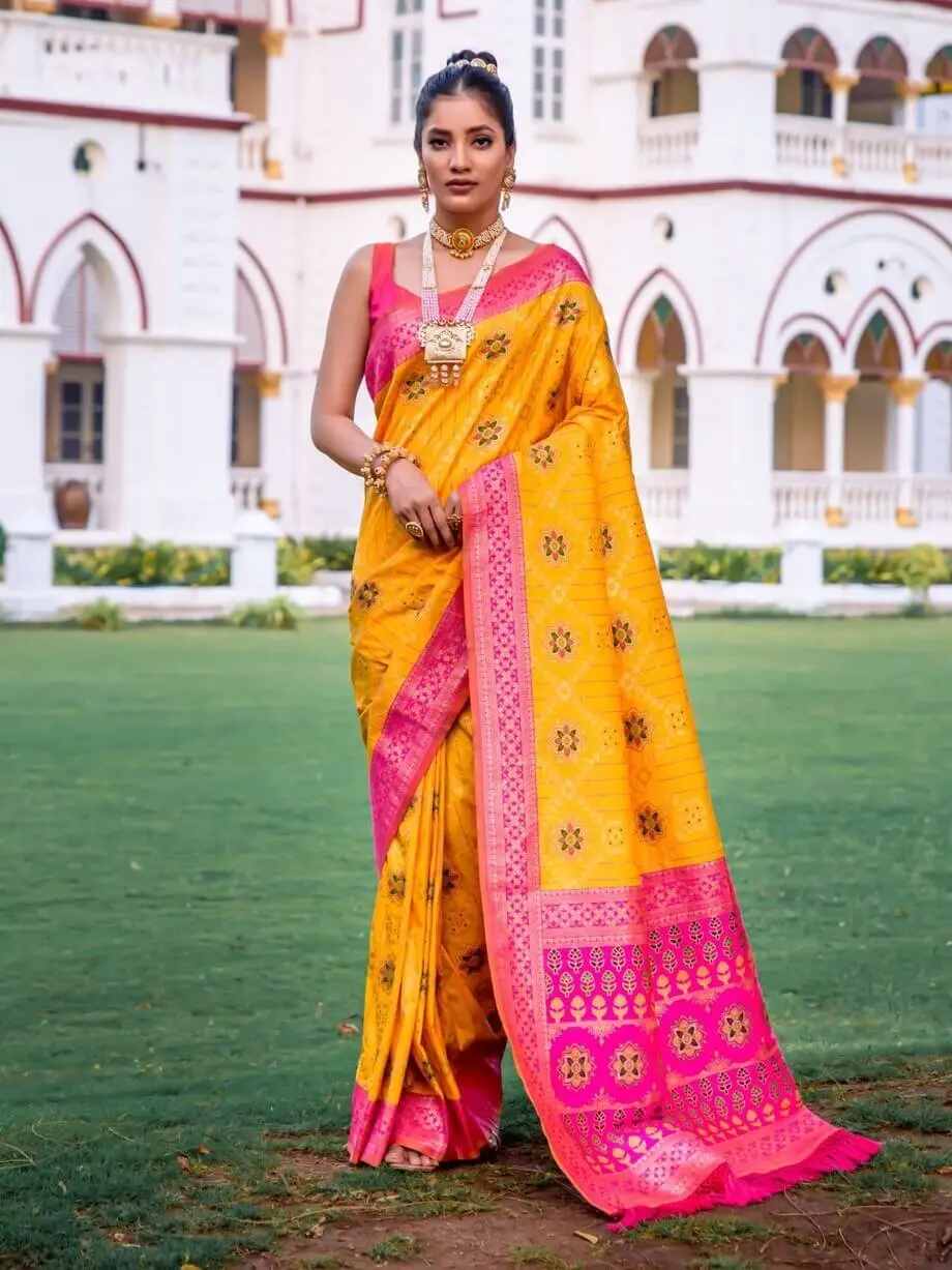 Get Your Glam On with Yellow And Pink Banarasi Patola Silk Saree