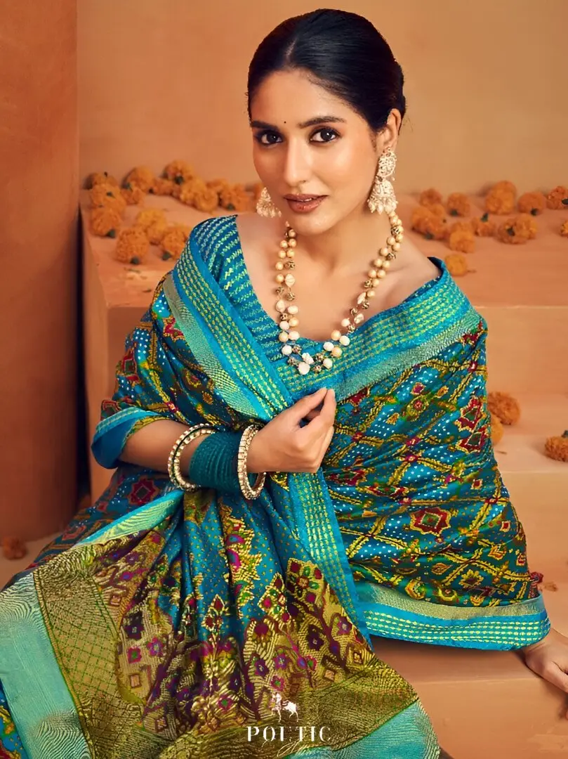Step Into Fabulous with Aqua Georgette Print Work Heavy Border Saree image 2