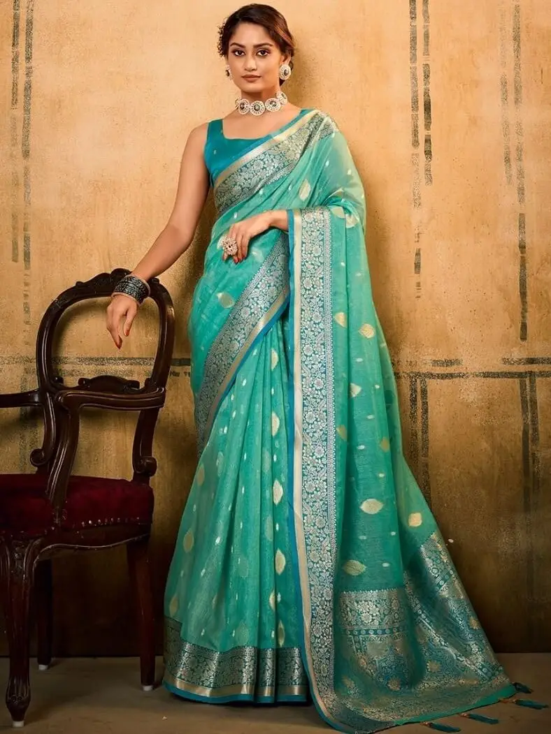 Get Your Glam On with Aqua Green Banarasi Silk Saree With Designer Blouse Piece