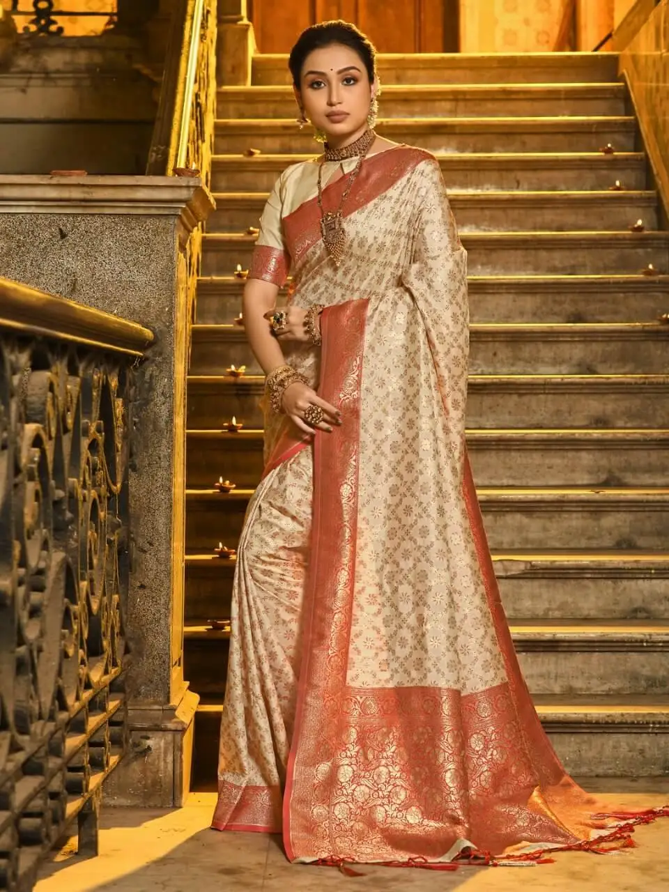 Step Into Elegance with Cream And Red Banarasi Silk Saree with All Over Zari Jaal And Contrasting Border